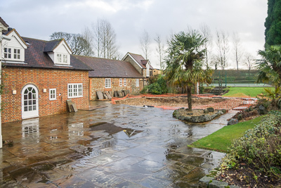 Acres of paving, a half-filled swimming pool and tropical rockeries