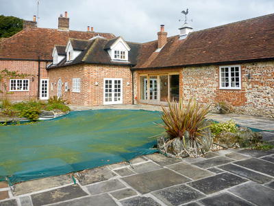 The old swimming pool with rockeries, on the terrace